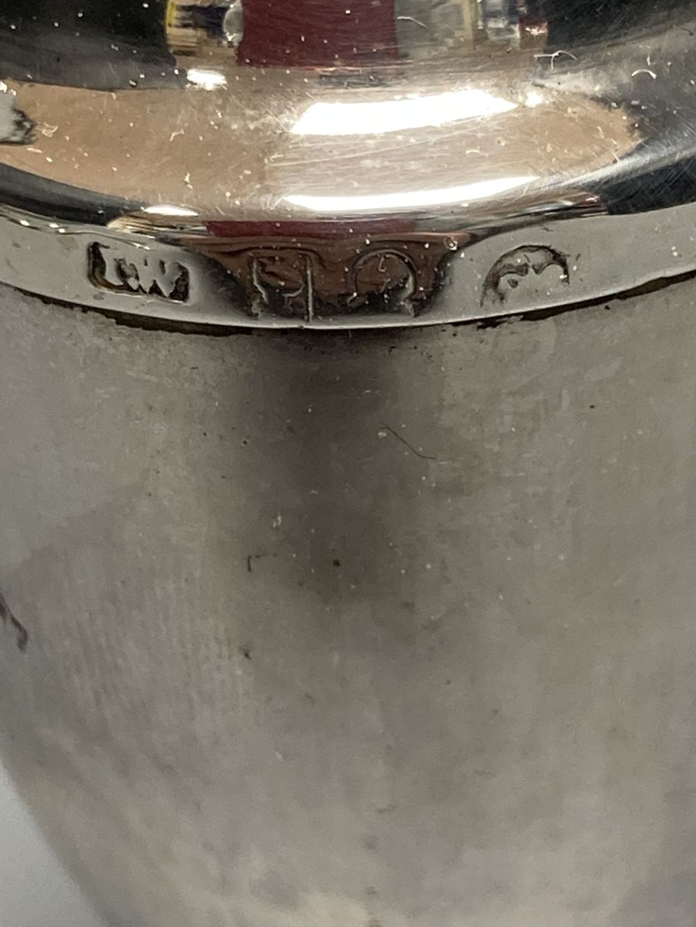 A pair of Georgian silver circular salts, a George III urn-shaped pepper pot and 4 various spoons.